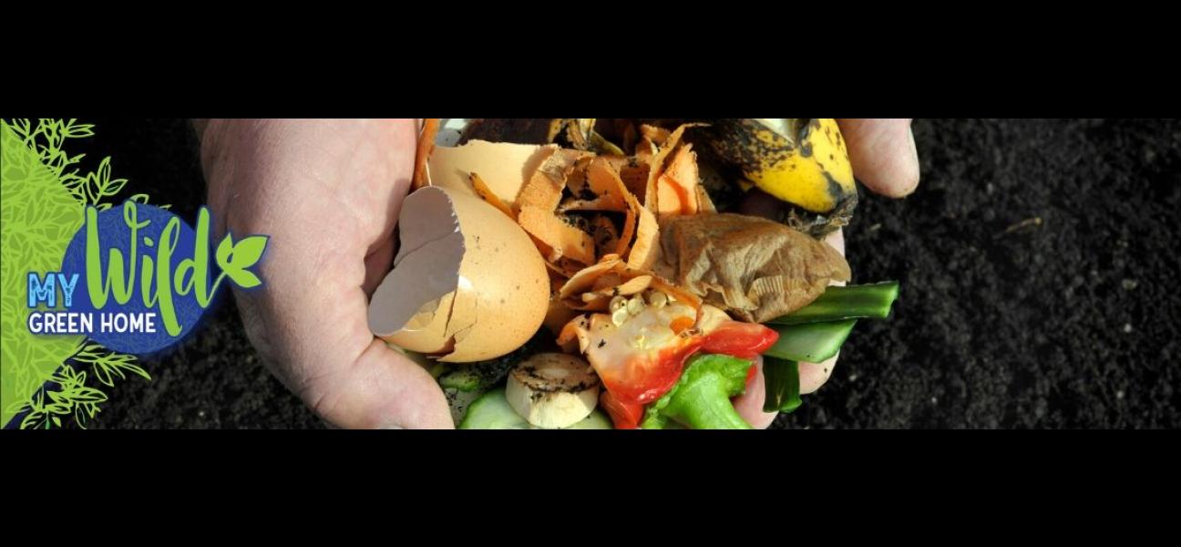 A handful of organic waste, including egg shells, banana peels, and vegetable scraps are held over a pile of dark brown dirt.